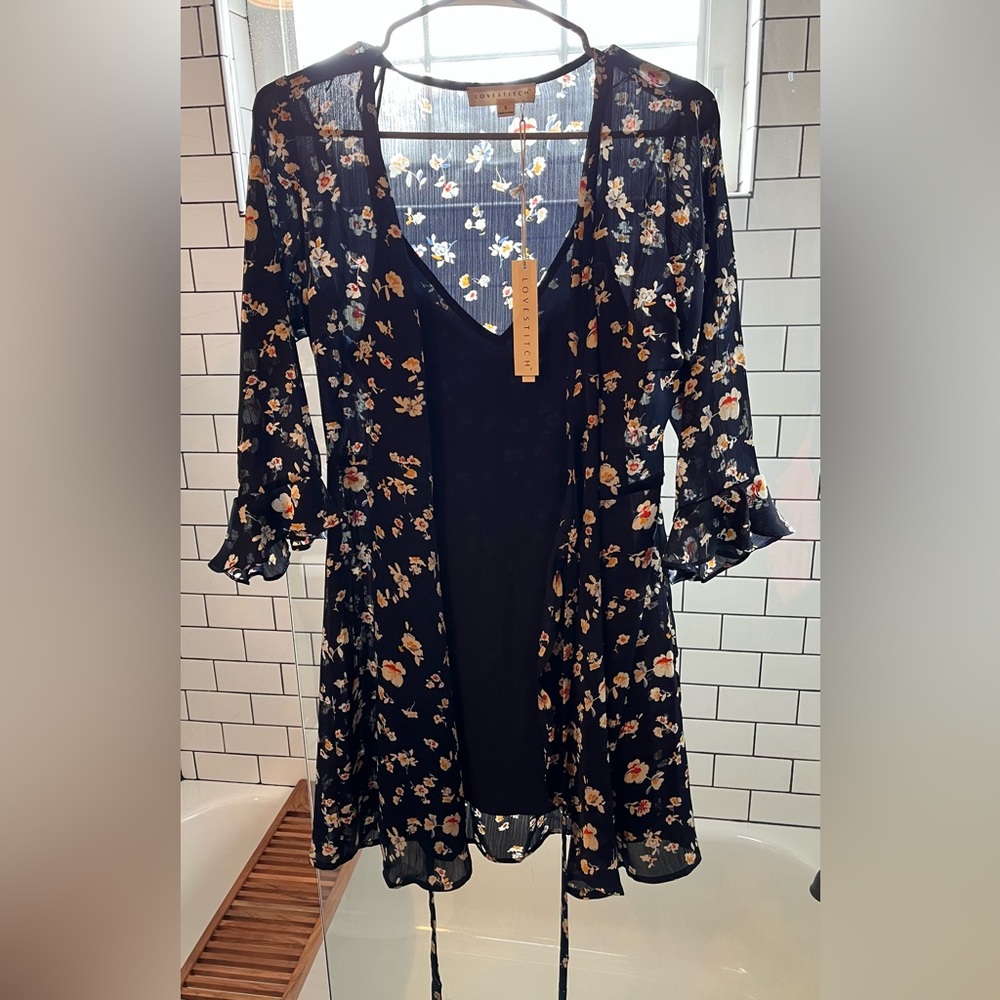 Navy floral wrap dress with slip. Size small from Vici. The brand is LOVESTITCH